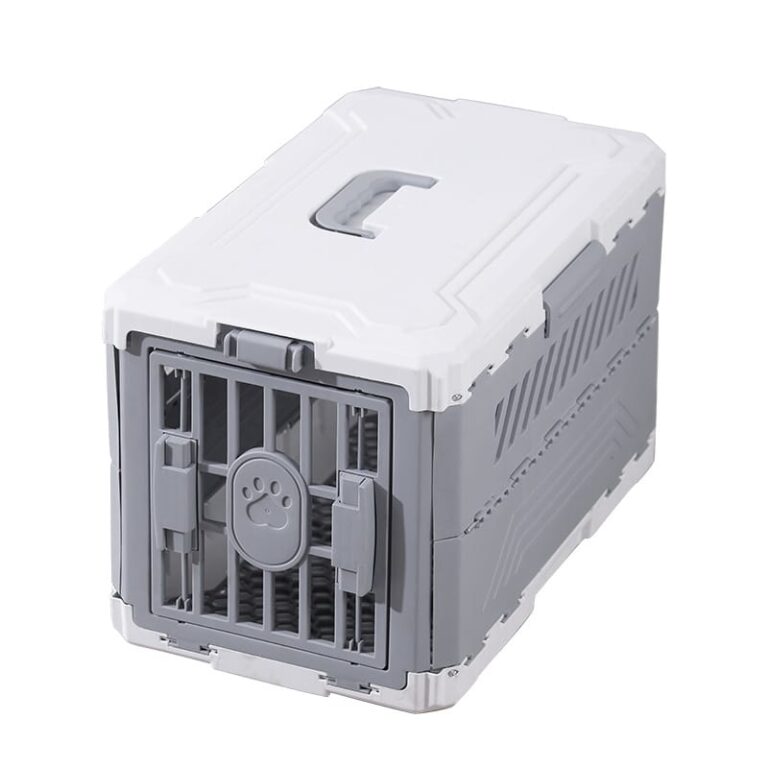 Gray and white hard-sided cat travel carrier on a white background