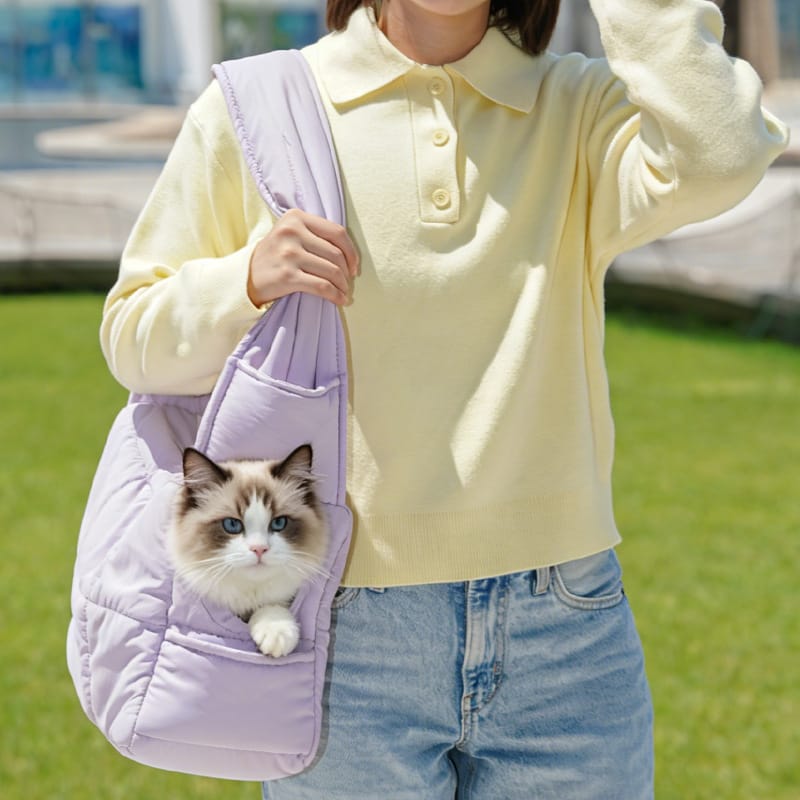 Mist purple cat carrier purse with cat looking through the head opening
