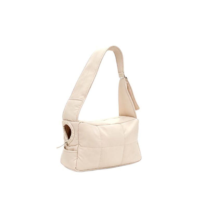 Khaki quilted small cat carrier purse on a white background